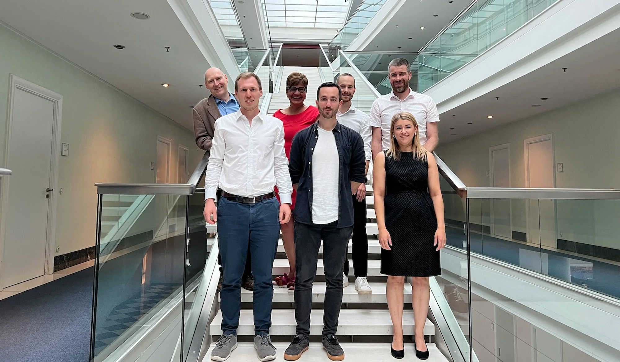 Gruppenbild mit Beamten der Staatskanzlei Bayern als Softwaredienstleister